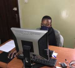 Sheila at her desk
