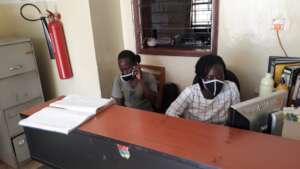 Gloria and Christine at the Front Desk