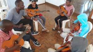 Holiday programme Guitar Class with Teacher George