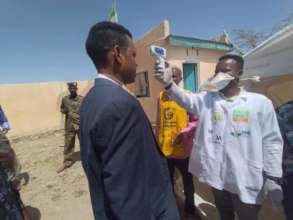 Conducting body temperature tests at the border