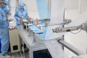 Mask production at our social enterprise, Protec