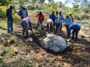 Community Breaking One Of Many Bolders In The Road