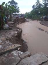 Road Collapse Into River