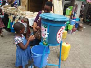 Educating girl child how to practice hand-washing