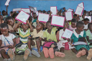 Children using CharChar's erasable whiteboards
