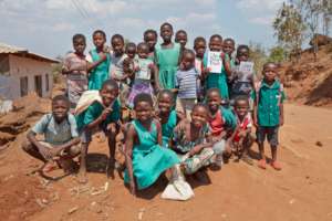 Children after school with their CharChar readers