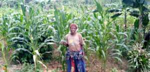 Cosma beneficiary at her garden