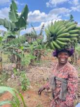 Lydia with her farm harvest
