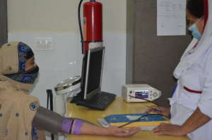 Nurse checking the vitals of an expecting mother