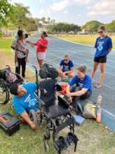 Fixing wheelchairs track side