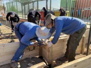 Team working on the planting beds