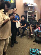 Leaders speaking with youth