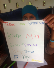 Habiba showing an art piece she created