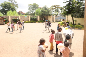 Kids playing in the Safe House playground