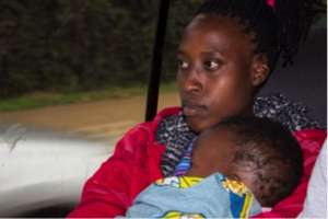 Lucie and her baby on their way to class