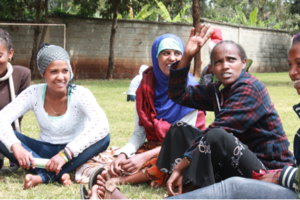 Safe house residents in a discussion group