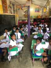 Students at St Margaret School, eager to learn.