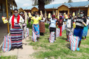 Families receive food, hand soap, and cooking oil
