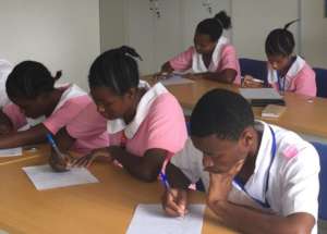 Trainee midwives sitting an exam