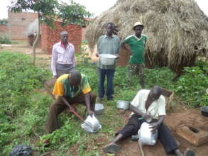 Artisan making saucepans
