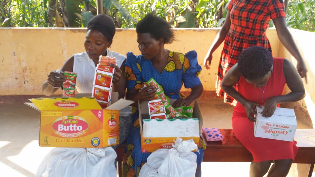 Women receive their shop items