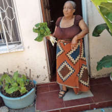 Mirriam sells her crops to help her neighbors