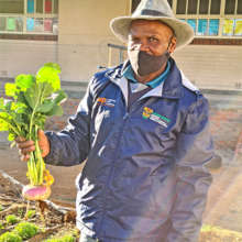 Proud gardener shows off first beet harvest