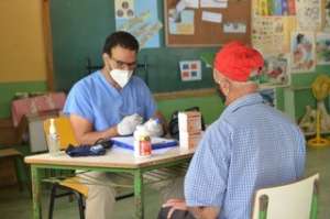 Our local doctor visiting patients