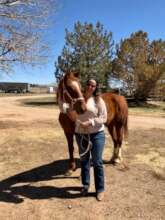 Birdie and her new forever owner, Larissa