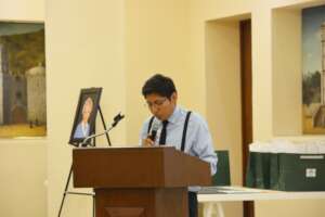 Luis giving a speech to the new students