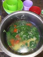 The vegetables are prepared by the family