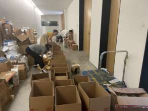 Rici team put coursewares into the parcels