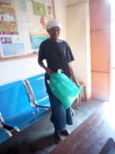 A survivor supported with food after rescue