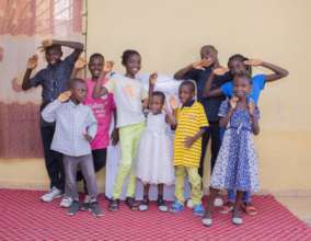 Displaced children taking time for photoshot