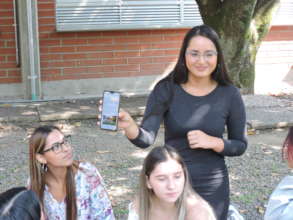 Presenting to her peers