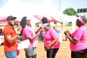 ASA Women USA honoring a breast cancer survivor