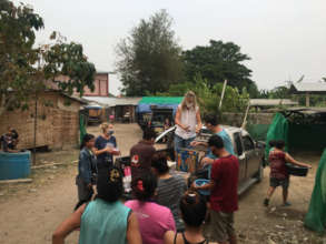 Distributing to 40 families in Thai Yai camp