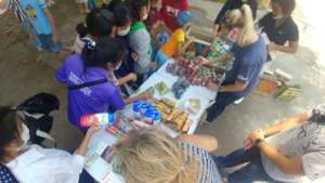 Distributing to Thai Yai teens