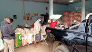 Loading rice for villagers