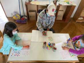 Making materials for their monthly project.