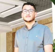 Hamza, a volunteer at Mrs Najah's Kitchen