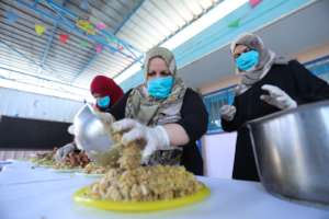 Mrs. Najah and workers from the WPC-Rafah