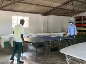 Youth enjoying pingpong at TWEENS Youth Center