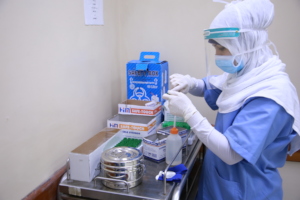 Lab Technician is working at Al Awda Hospital Lab.