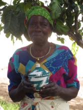 Grandmother holding a basket she made