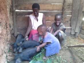Jane, Timothy, Joel and their piglets