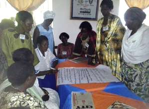 Grandmothers brainstorming during TOT workshop.