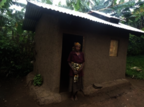 Roselia in front of her new kitchen