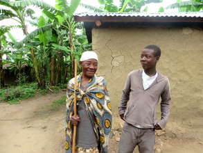 Granny and Grandson in Front of Their New Kitchen