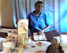 Provia displaying the products she sells